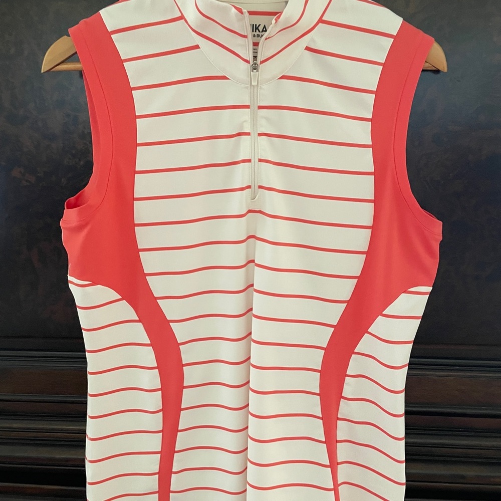 Annika by Cutter & Buck sleeveless half-zip top.